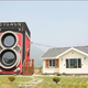 Illustration for article titled This crazy giant camera is not a fake but an awesome two-story café